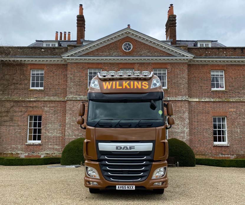 Large Wilkins Removals lorry in front of mansion
